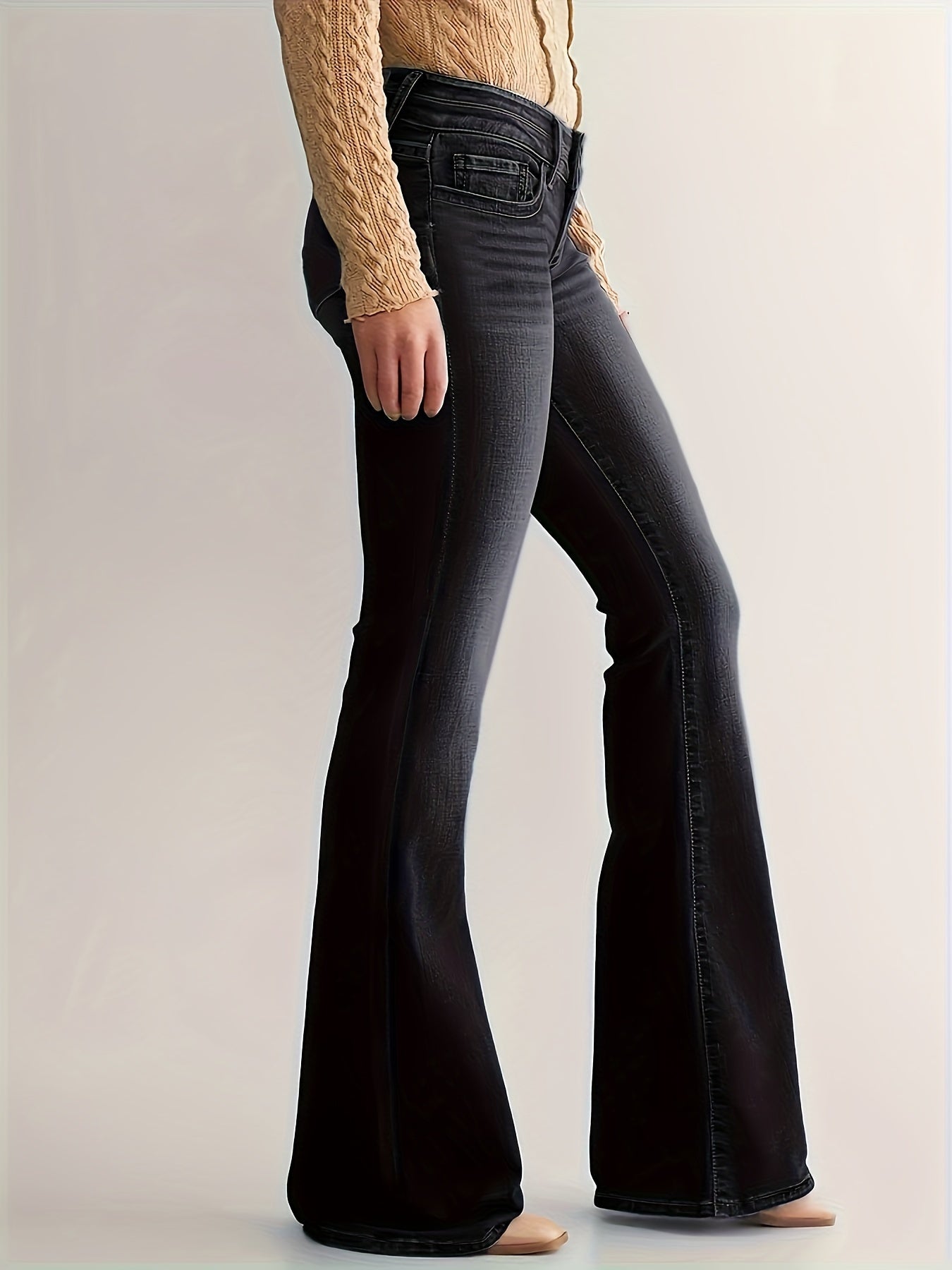 Jeansy dzwony z wysokim stanem - średnioniebieskie spodnie jeansowe damskie