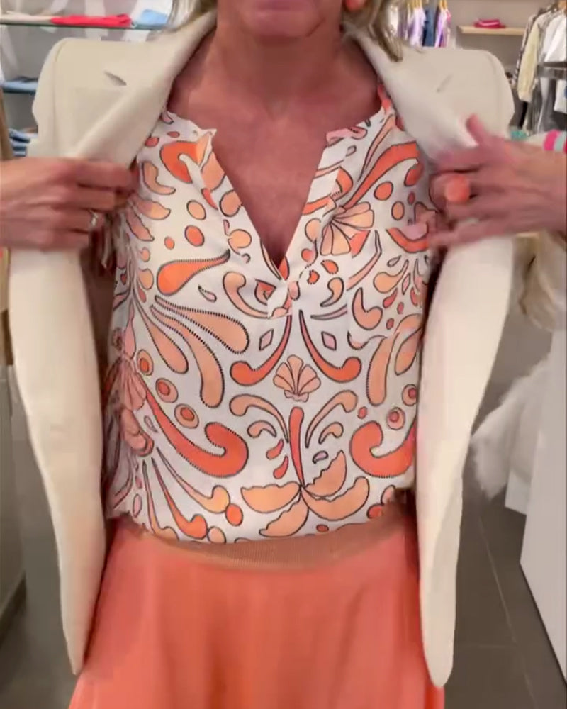 Bluzka casualowa z dekoltem w serek i rękawami typu raglan z nadrukiem