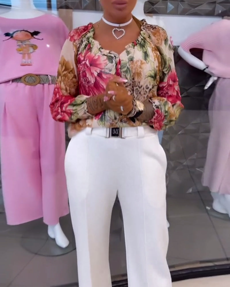 Bluzka z dekoltem w serek i nadrukiem kwiatowym