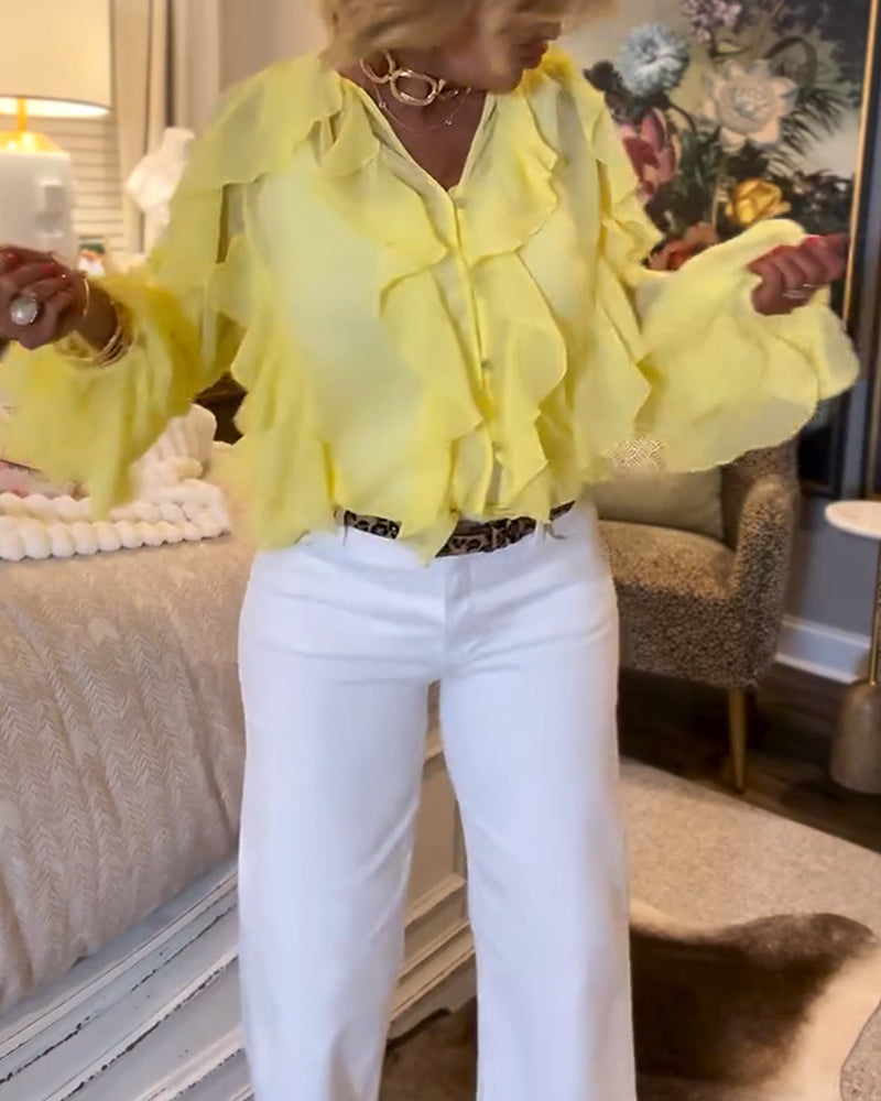 Luźna, prosta bluzka z falbankami