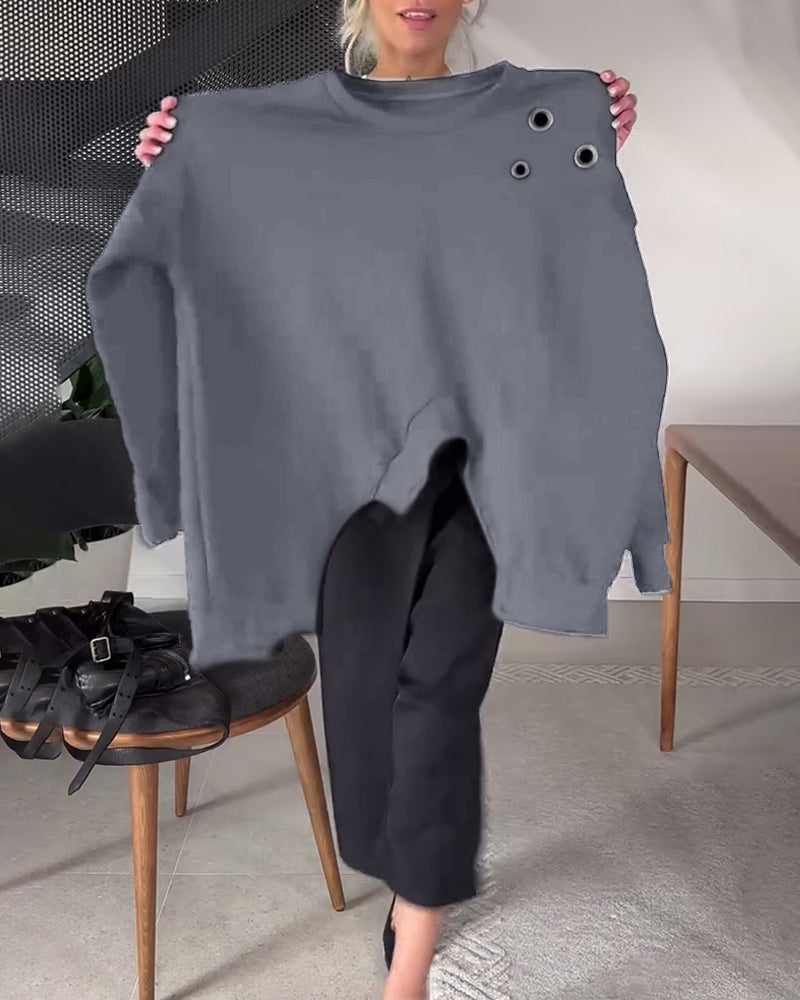 Prosta, swobodna bluza z okrągłym dekoltem i rozcięciem