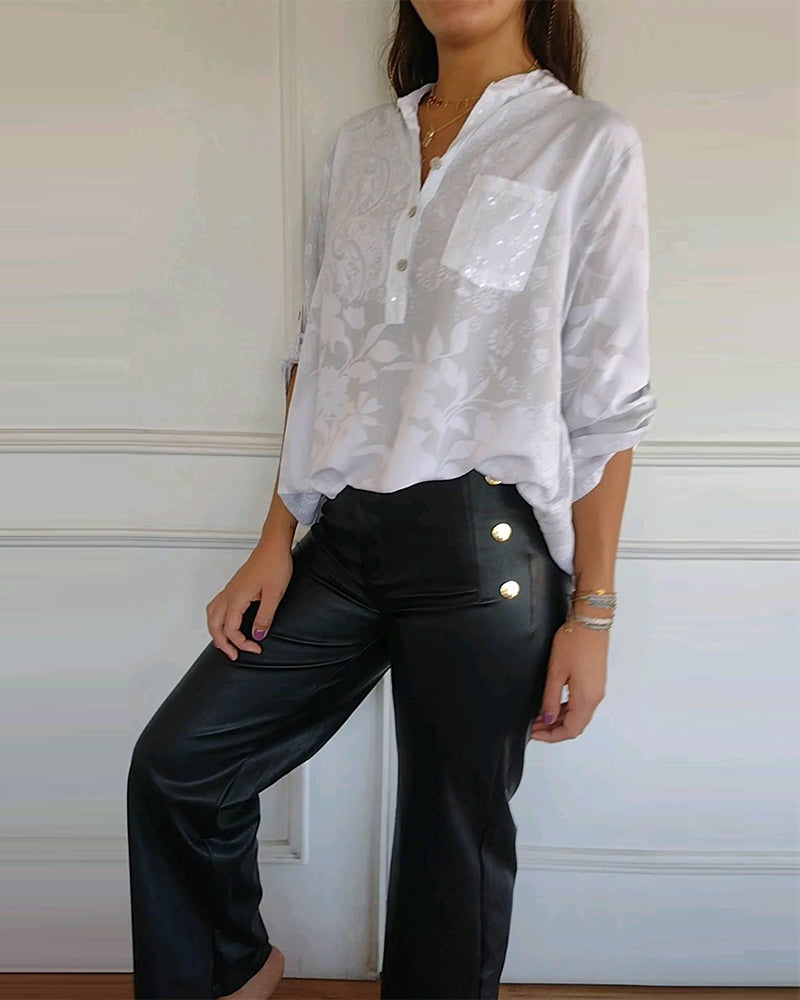 Elegancki top w jednolitym kolorze z kieszenią na guziki