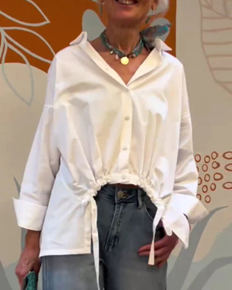 Gładka bluzka z klapami do dojazdów do pracy