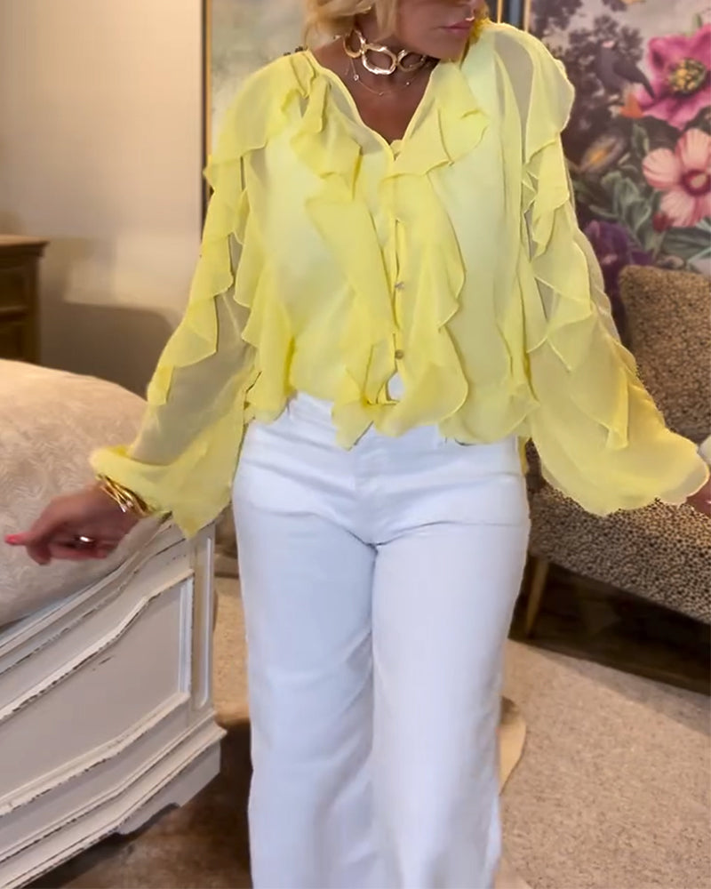 Luźna, prosta bluzka z falbankami