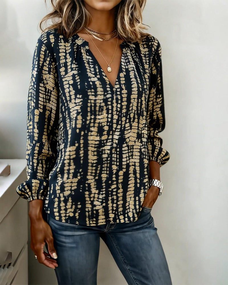 Top z nadrukiem, stójką i długimi rękawami