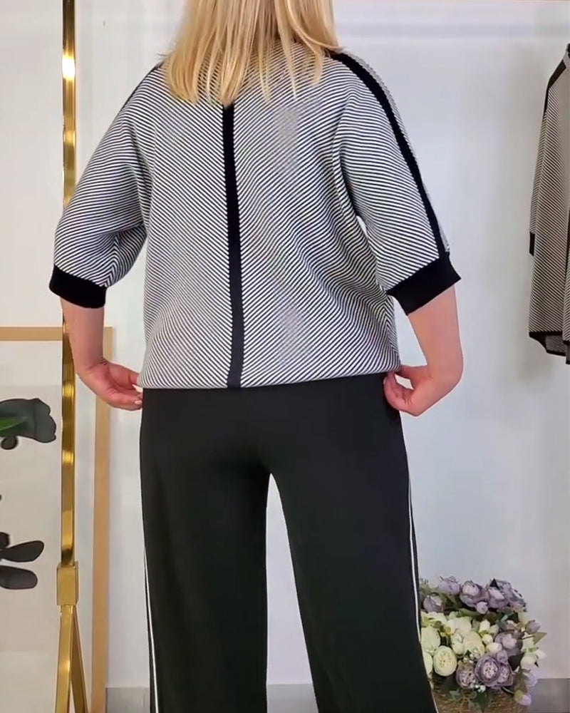 Luźna, dzianinowa koszulka w paski