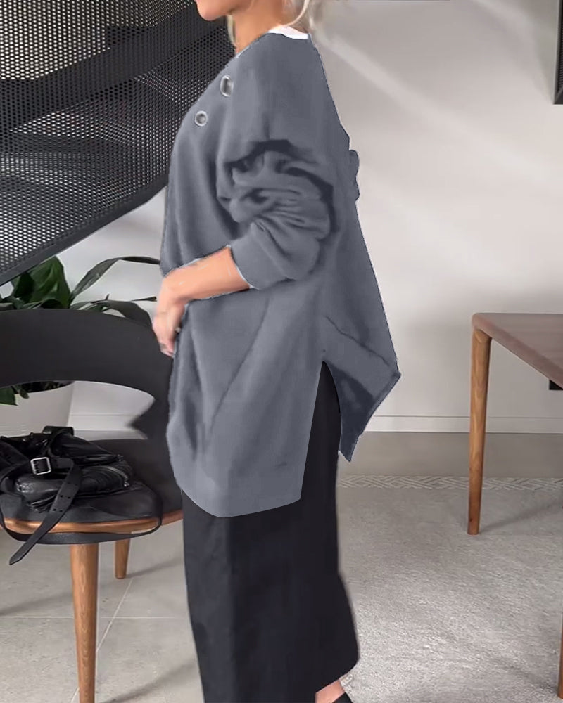 Prosta, swobodna bluza z okrągłym dekoltem i rozcięciem