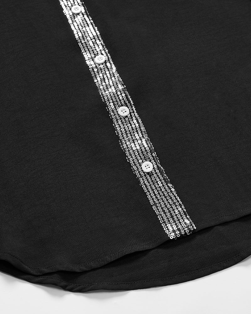 Luźny top z guzikami i cekinami