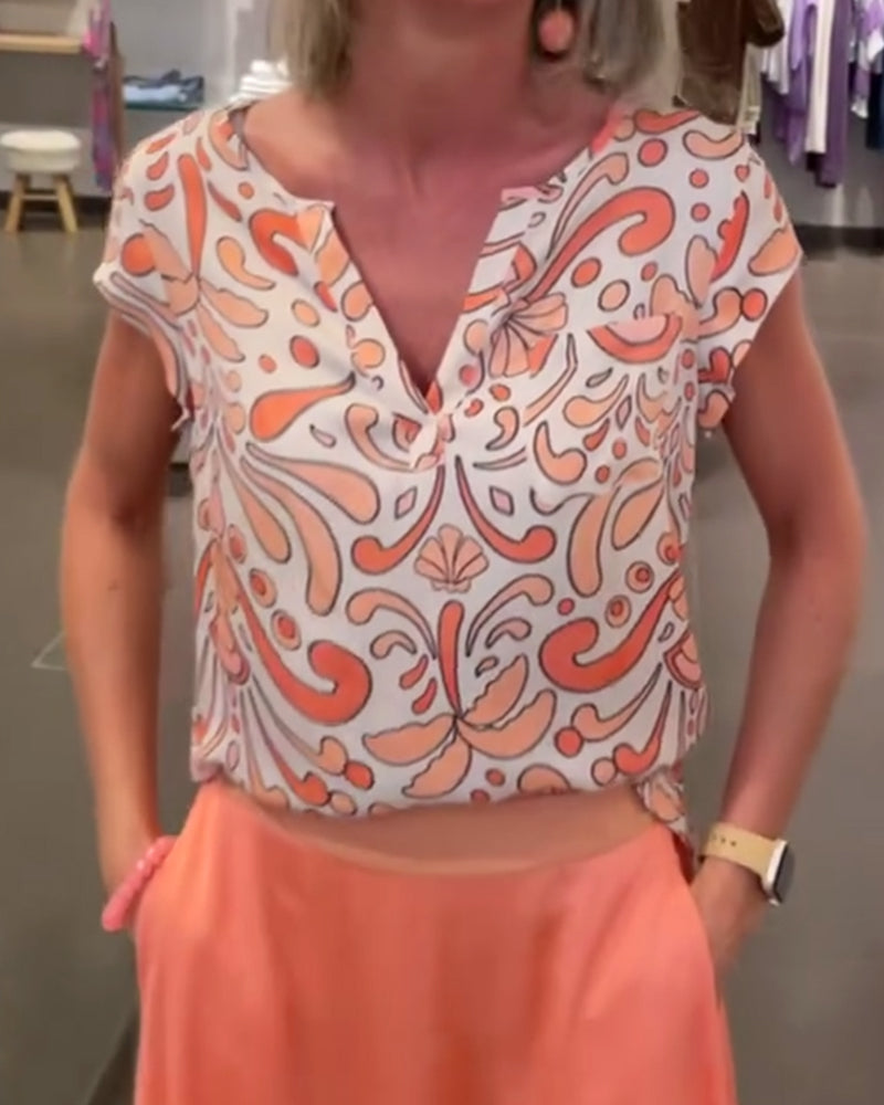 Bluzka casualowa z dekoltem w serek i rękawami typu raglan z nadrukiem