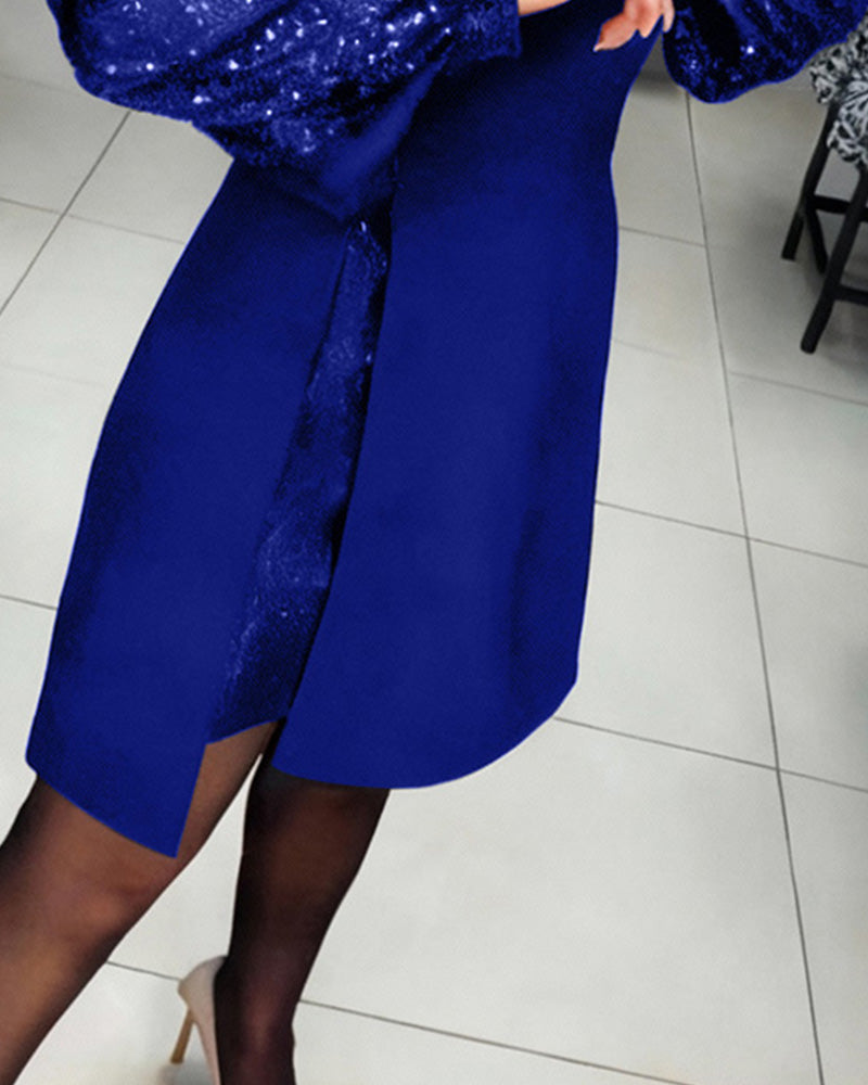 Elegancka sukienka z bufiastymi rękawami i patchworkowymi detalami