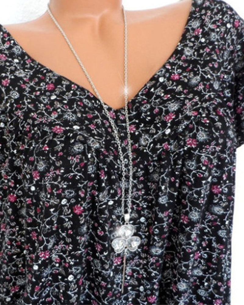 Luźna koszulka z krótkim rękawem i dekoltem w serek