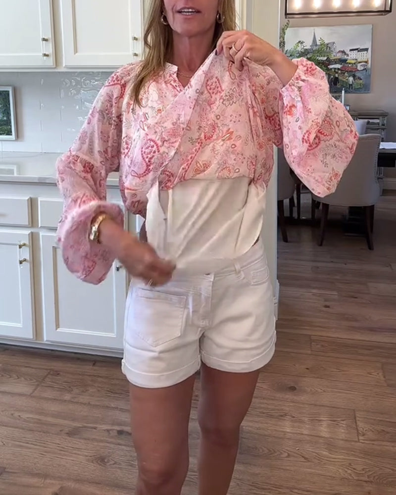 Bluzka z bufiastymi rękawami i kwiatowym nadrukiem