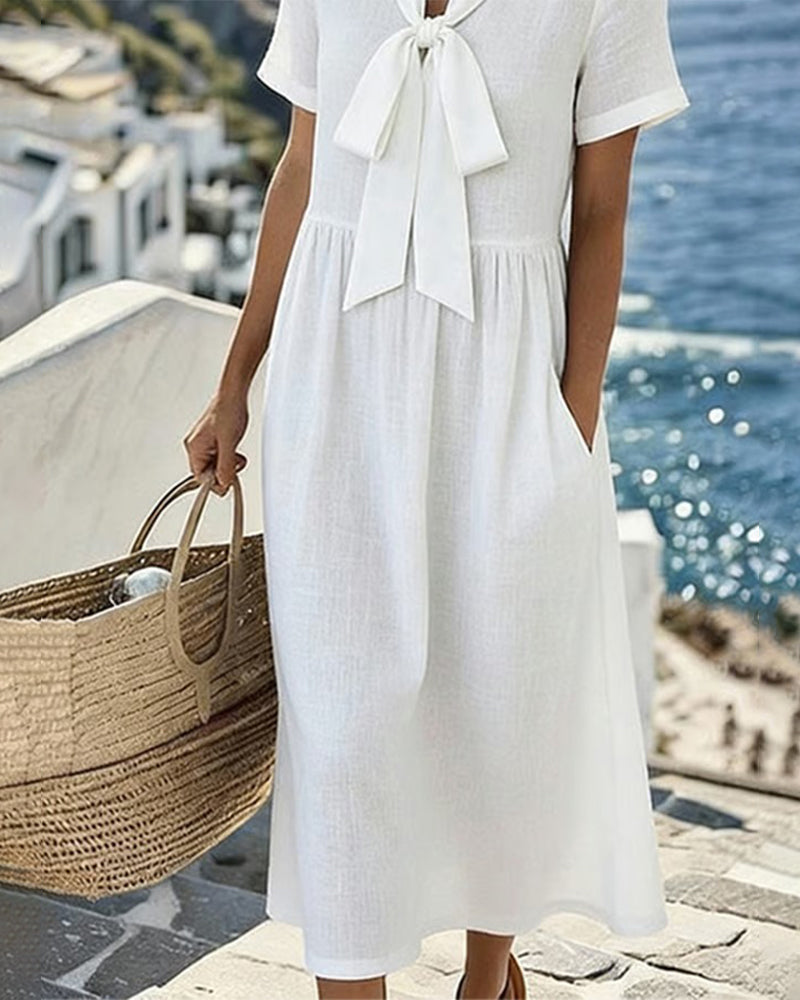 Elegancka sukienka z krótkim rękawem w kształcie litery A