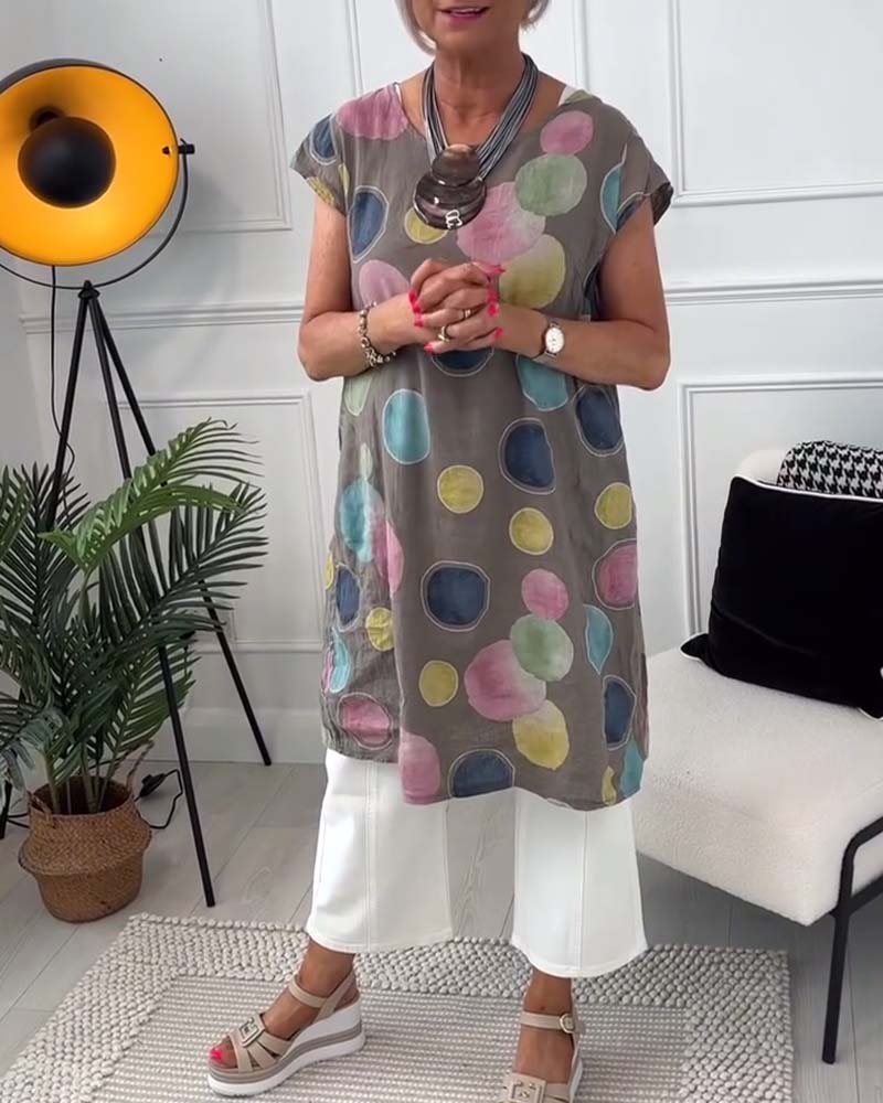 Kolorowa bluzka w groszki