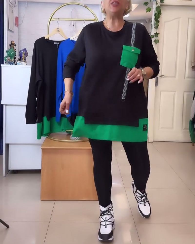 Luźna bluza z okrągłym dekoltem, kieszeniami i kontrastowymi kolorami