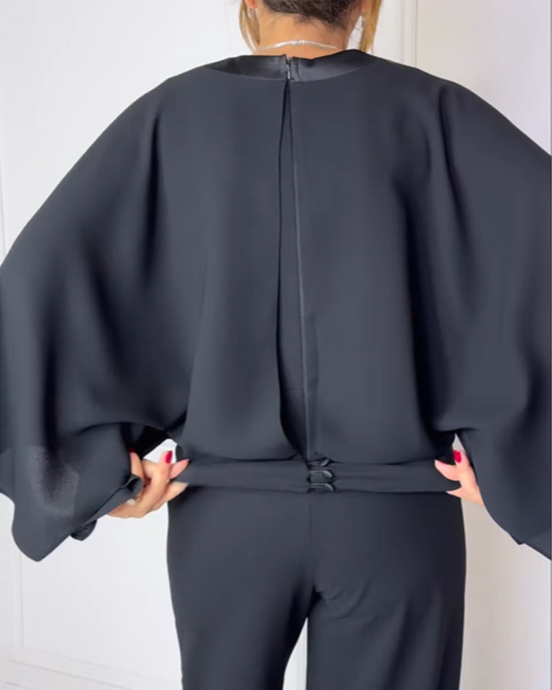 Bluzka z dekoltem w serek i eleganckim rękawem motylkowym