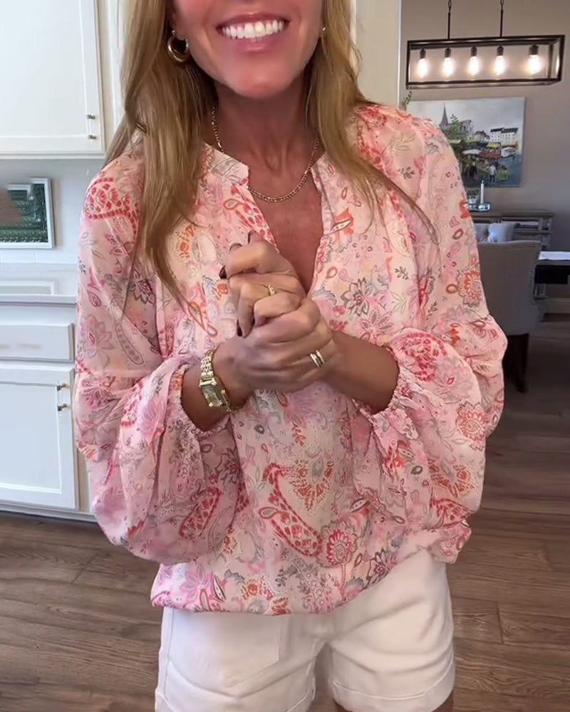 Bluzka z bufiastymi rękawami i kwiatowym nadrukiem