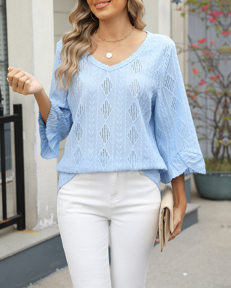 Rękawy trąbkowe z wycięciami i wzorem diamentowym