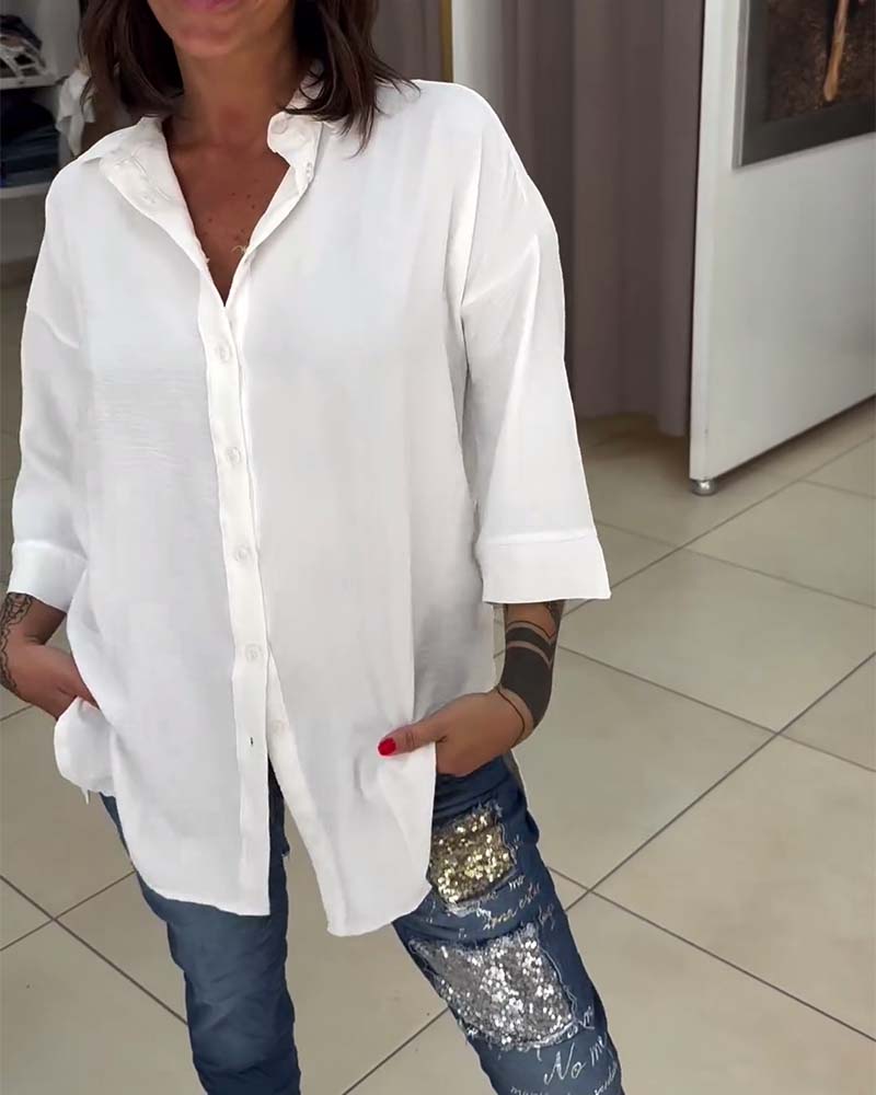 Koszula w jednolitym kolorze z guzikami i klapami