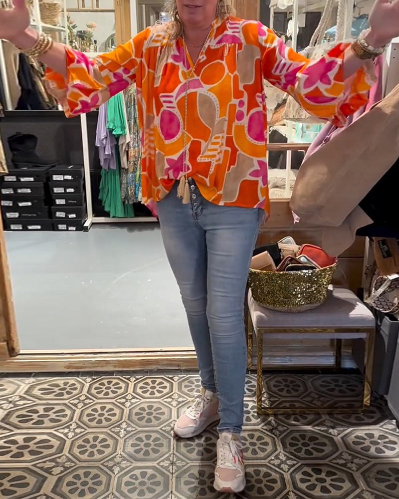 Bluzka z kolorowymi i opadającymi ramionami