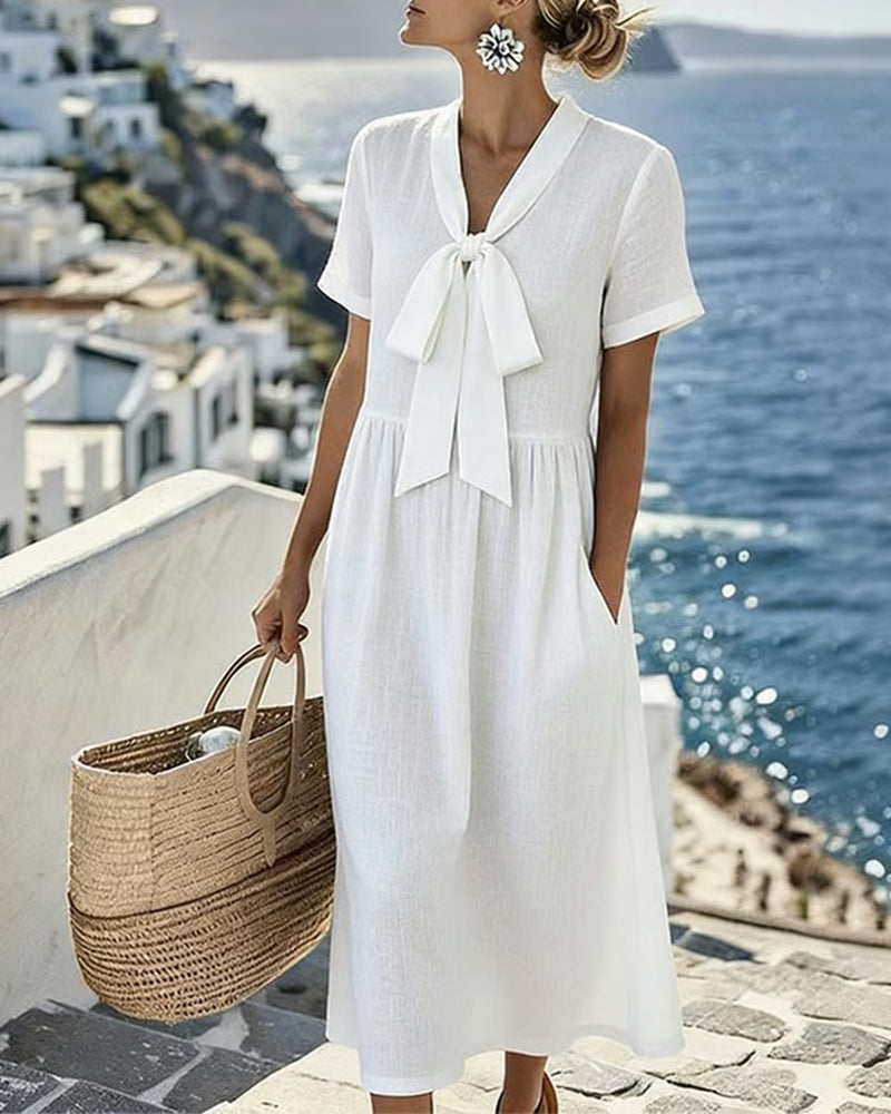 Elegancka sukienka z krótkim rękawem w kształcie litery A