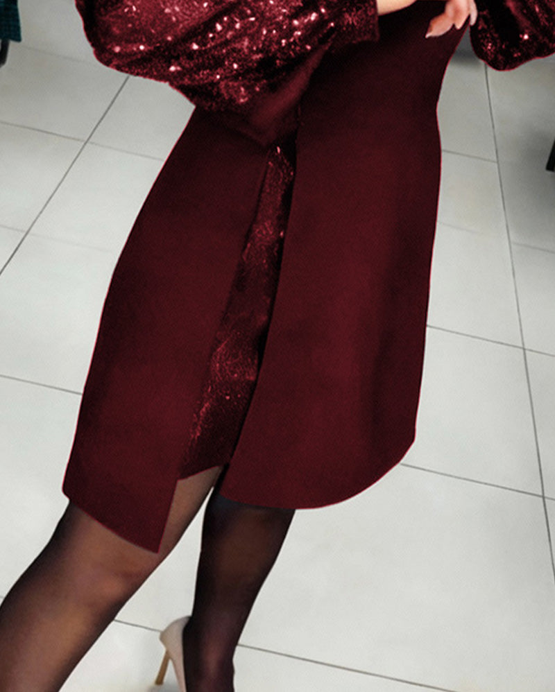 Elegancka sukienka z bufiastymi rękawami i patchworkowymi detalami