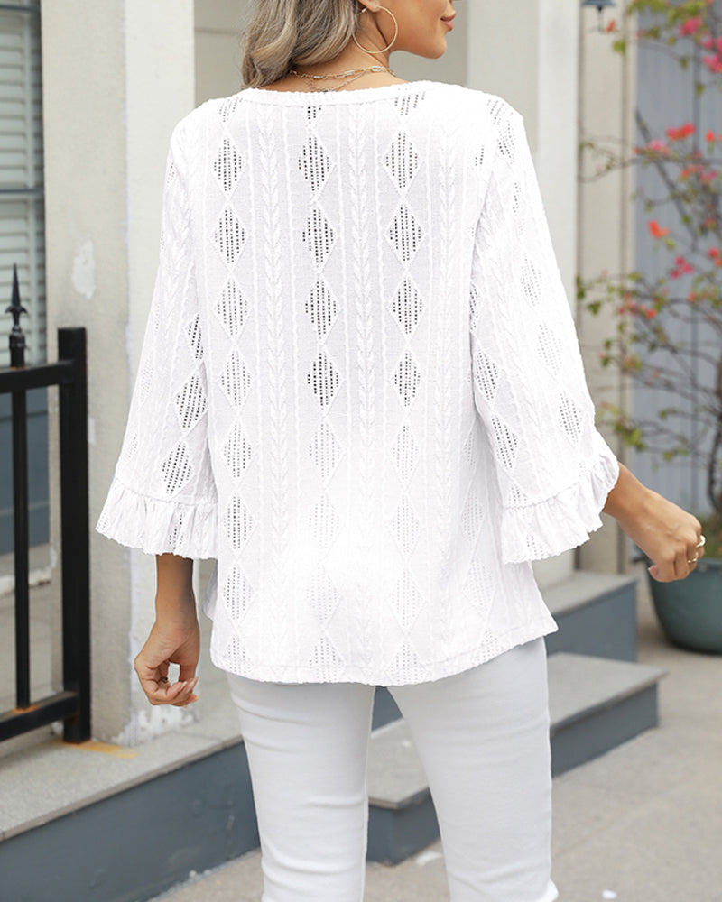 Rękawy trąbkowe z wycięciami i wzorem diamentowym