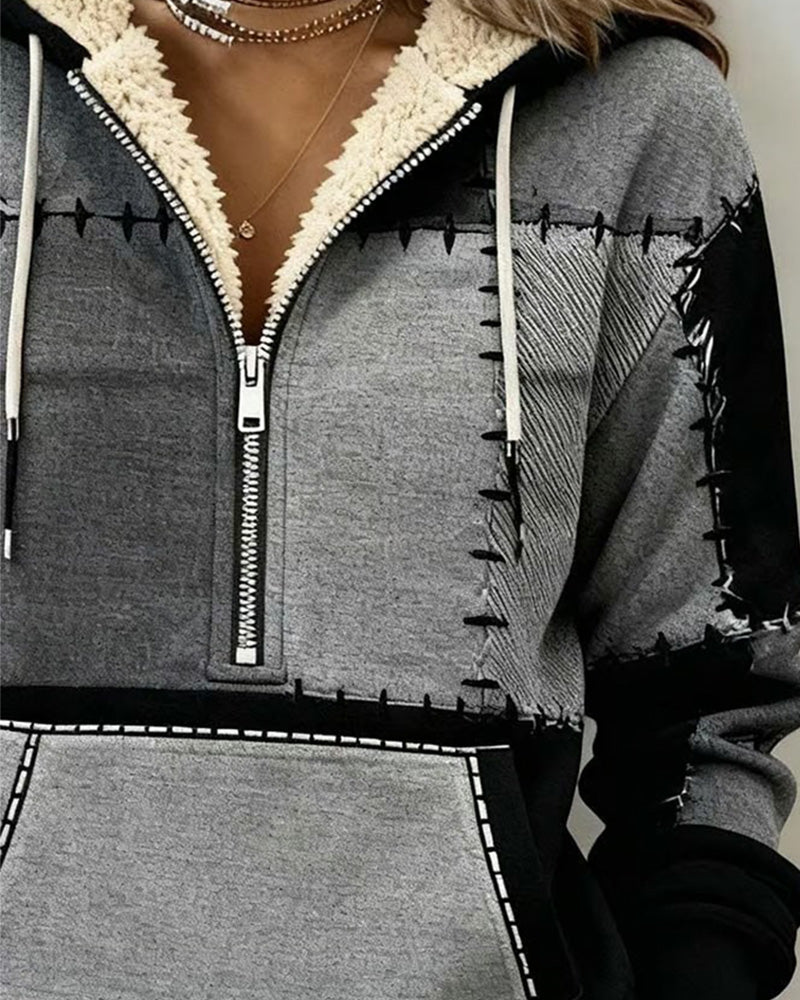 Sweter z kapturem, zapinany na pół suwaka i kieszenią