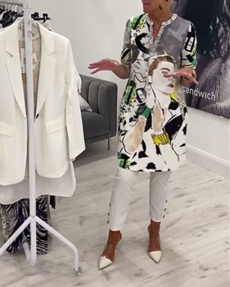 Luźny, długi top z guzikami i nadrukiem postaci