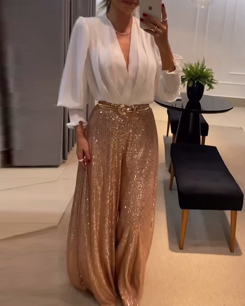 Elegancka bluzka z dekoltem w serek i rękawami typu lampion