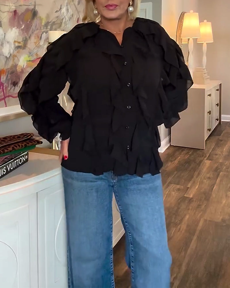 Luźna, prosta bluzka z falbankami