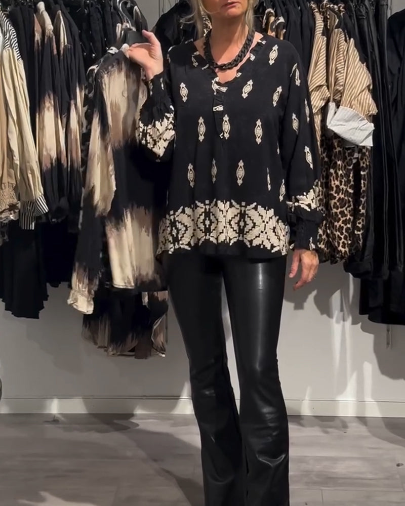 Koszula z dekoltem w serek i rękawami typu „latarnia”