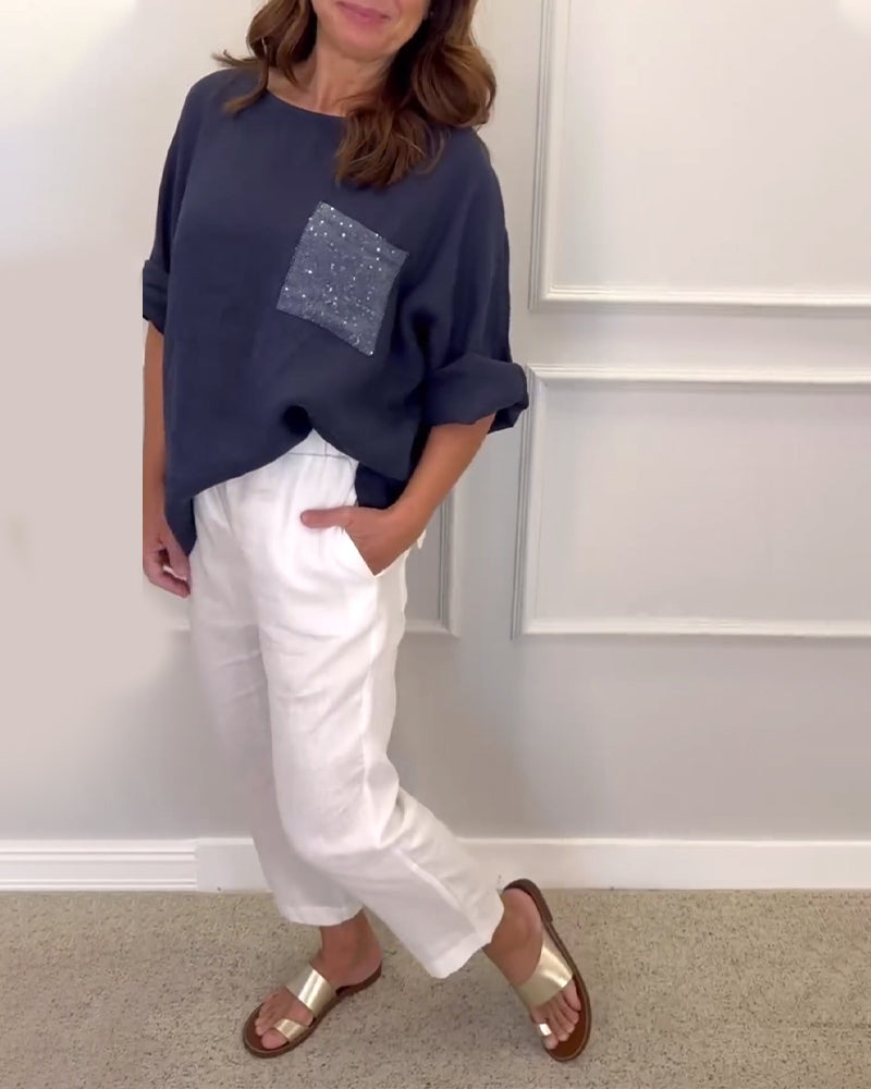 Bluzka z okrągłym dekoltem i kieszeniami z cekinów