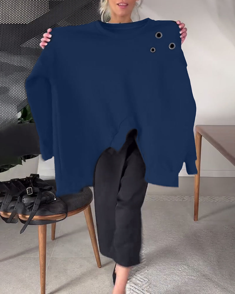 Prosta, swobodna bluza z okrągłym dekoltem i rozcięciem