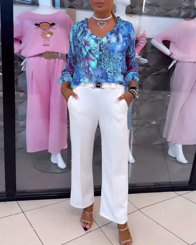 Bluzka z dekoltem w serek i nadrukiem kwiatowym