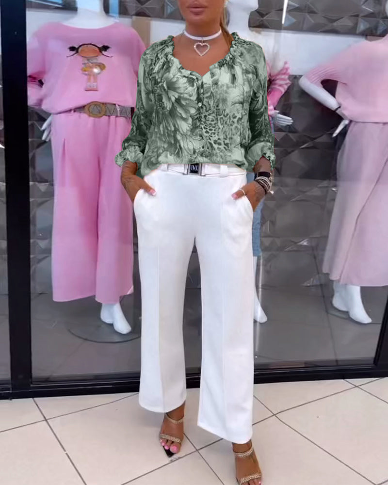 Bluzka z dekoltem w serek i nadrukiem kwiatowym