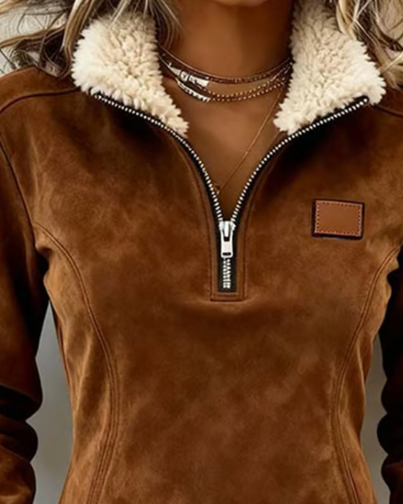 Bluza z kołnierzami zapinanymi na suwak, asymetrycznym krojem i frędzlami