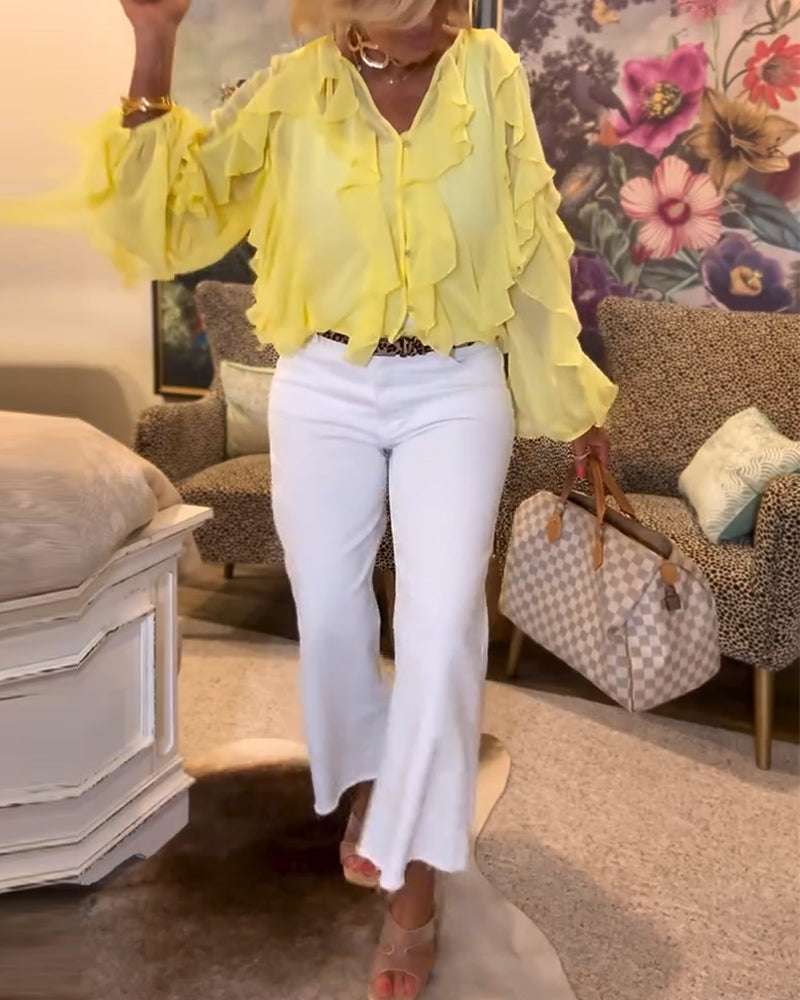 Luźna, prosta bluzka z falbankami