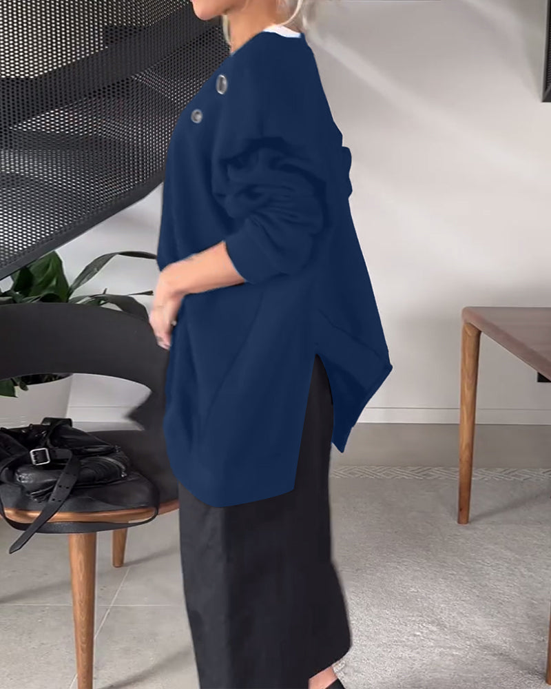 Prosta, swobodna bluza z okrągłym dekoltem i rozcięciem