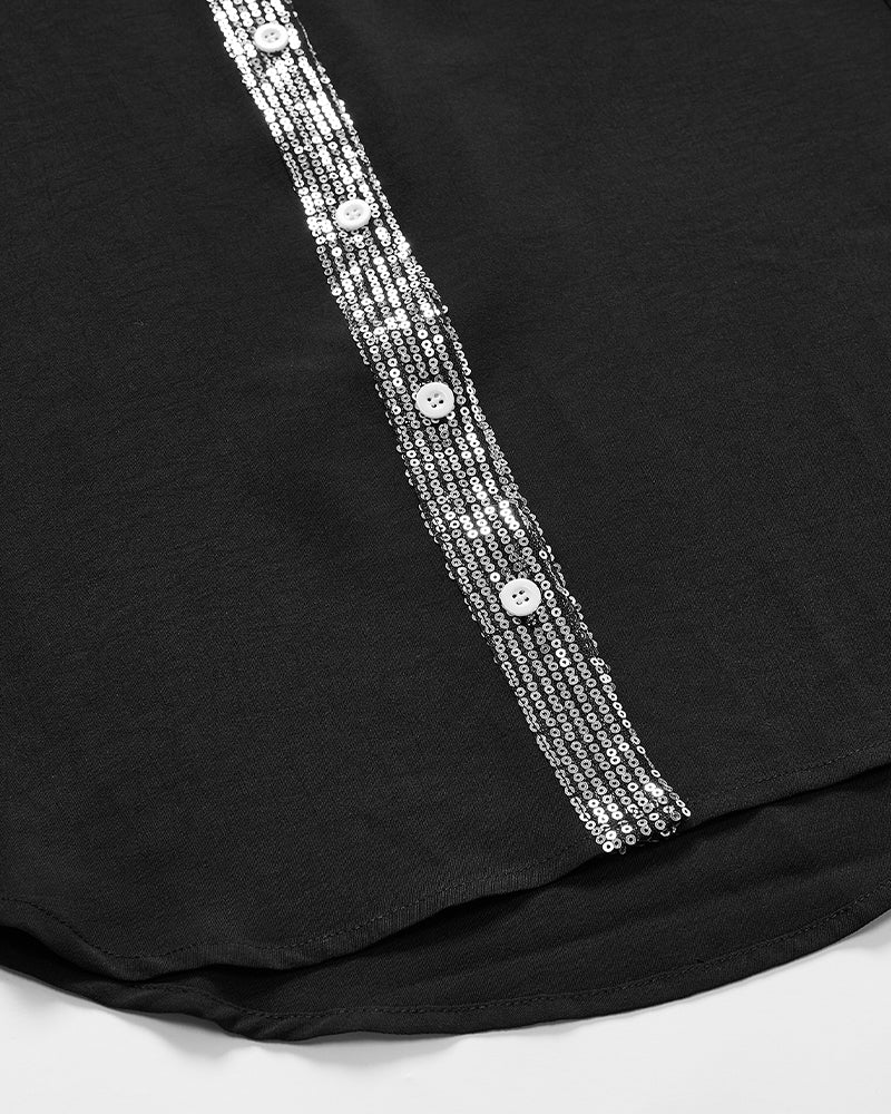 Luźny top z guzikami i cekinami