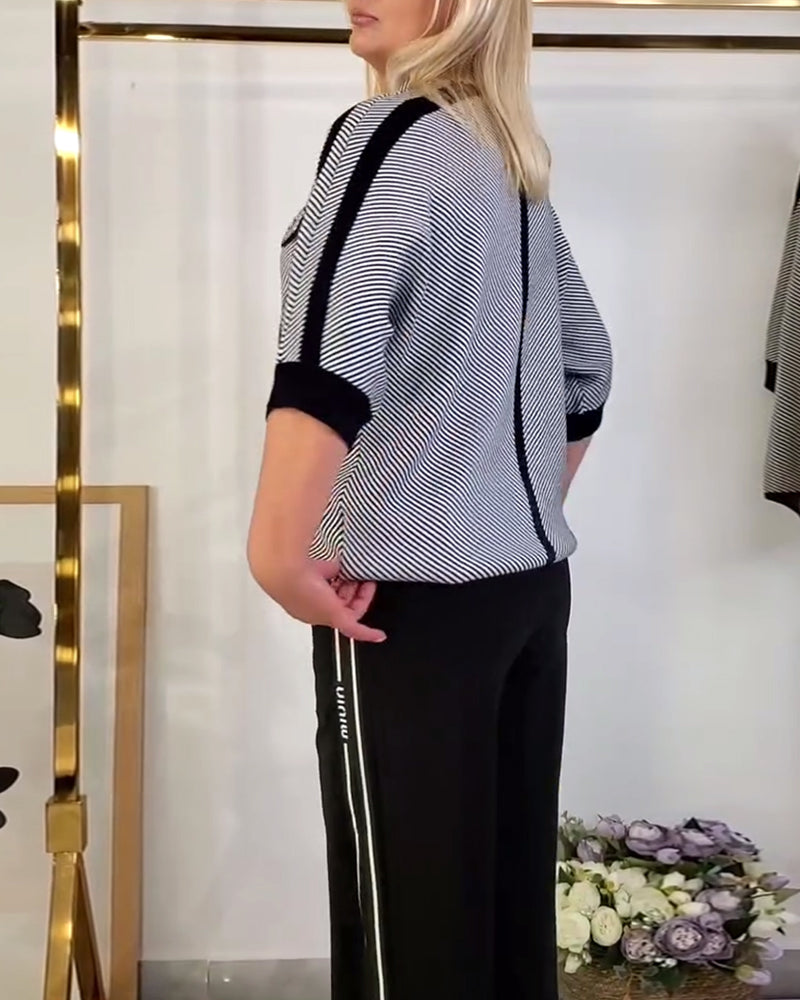 Luźna, dzianinowa koszulka w paski