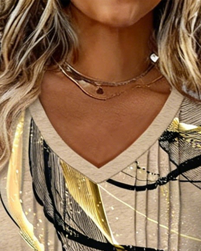 Top z dekoltem w serek, nadrukiem w paski pod pachami, długim rękawem