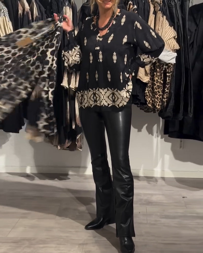 Koszula z dekoltem w serek i rękawami typu „latarnia”