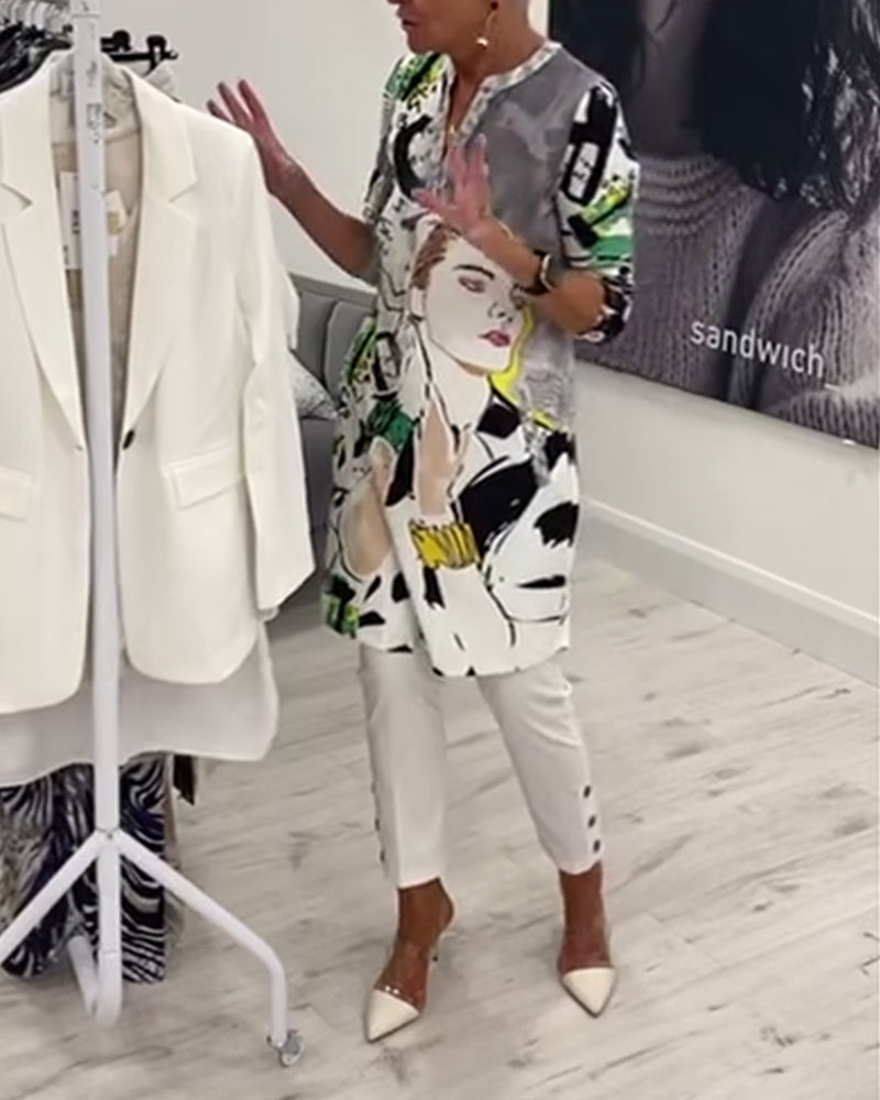 Luźny, długi top z guzikami i nadrukiem postaci