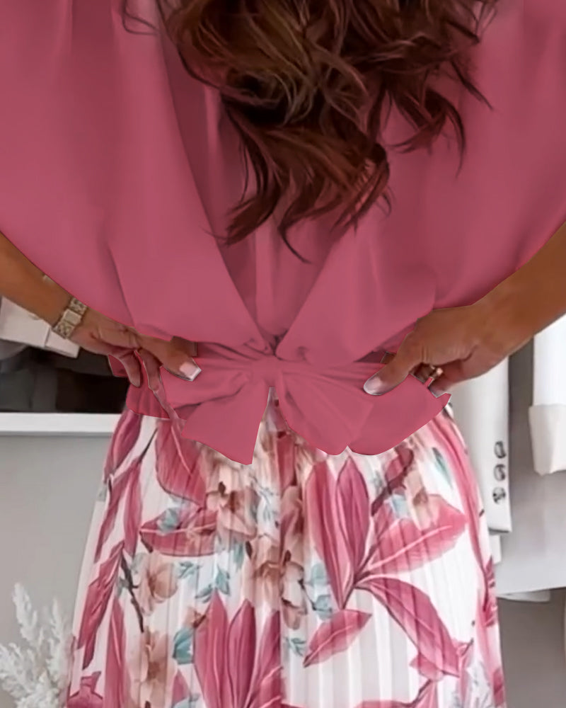 Bluzka w jednolitym kolorze, z kokardą w talii i krótkim rękawem