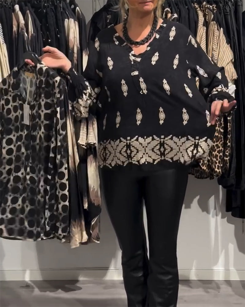 Koszula z dekoltem w serek i rękawami typu „latarnia”