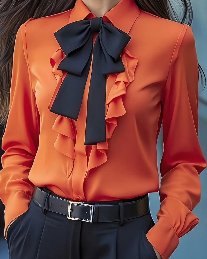 Bluzka z długim rękawem, kokardą i falbankami