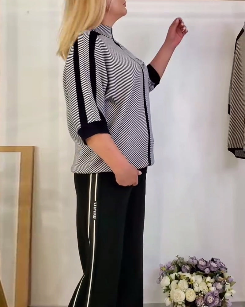 Luźna, dzianinowa koszulka w paski