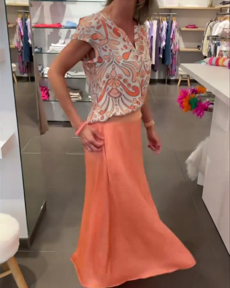 Bluzka casualowa z dekoltem w serek i rękawami typu raglan z nadrukiem