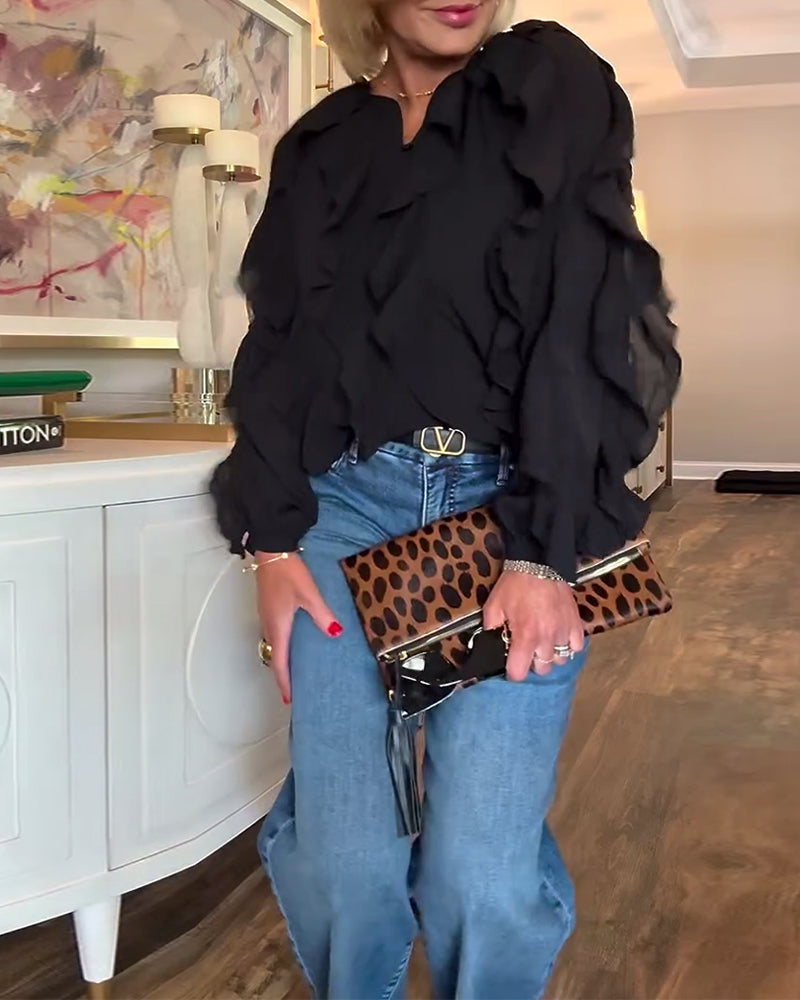 Luźna, prosta bluzka z falbankami